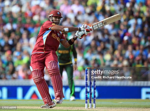 Kieron Pollard of West Indies hits the ball to the boundary during the ICC Champions Trophy group B match between West Indies and Pakistan at The...