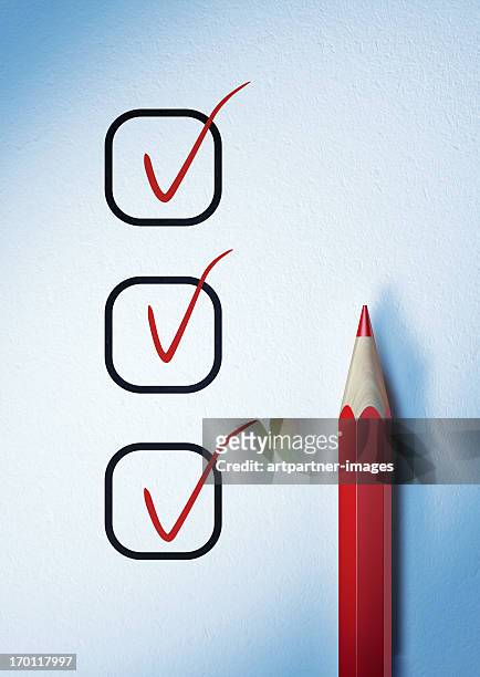 checked off or ticked list and a red pencil - responsibility stock-fotos und bilder
