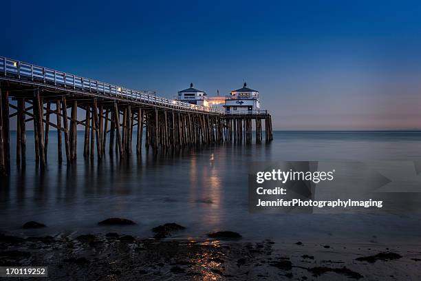 malibu beach sunset - malibu beach california stock pictures, royalty-free photos & images