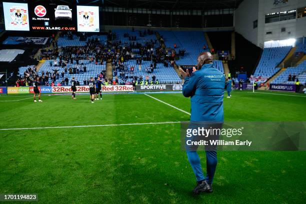 Manager Darren Moore of Huddersfield Town claps the fans at full time during the Sky Bet Championship match between Coventry City and Huddersfield...