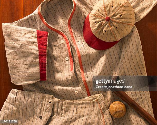 old-time wool baseball uniform with cap, pants and bat - baseball uniform stock pictures, royalty-free photos & images