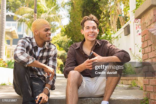 Young Men Having Fun High-Res Stock Photo - Getty Images
