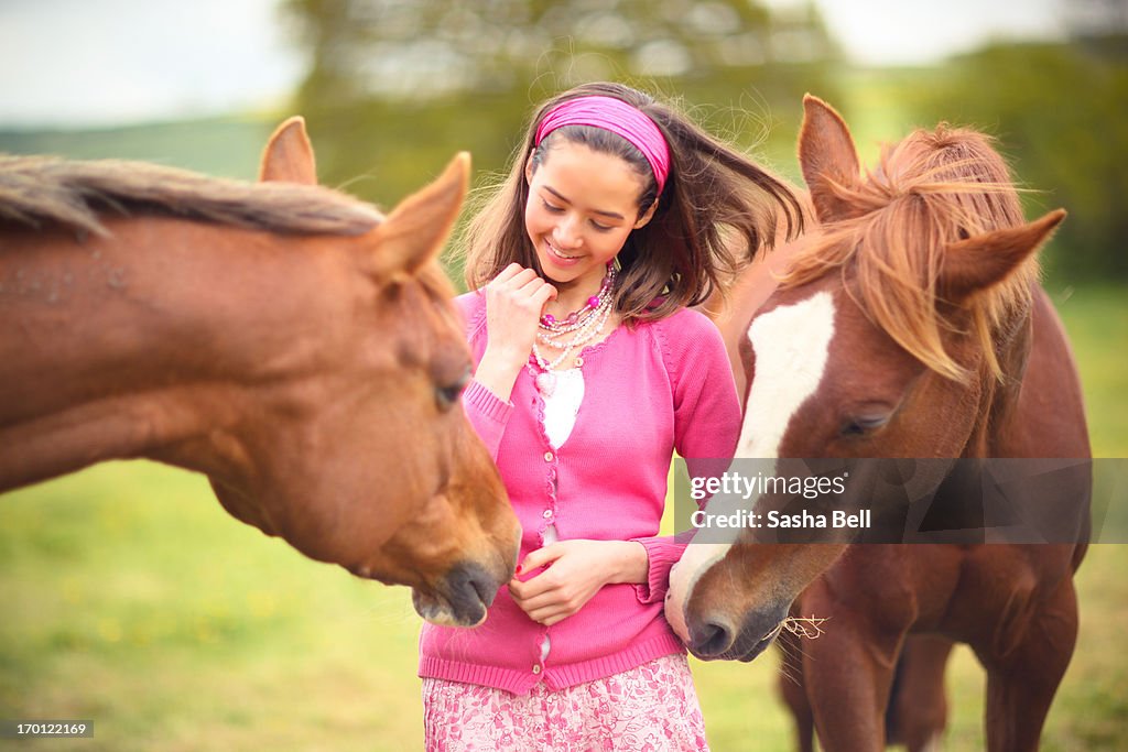 Girl In Pink with Two Chestnut Horses