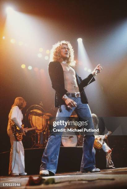 English rock group Led Zeppelin performing on stage at Madison Square Garden, New York, June 1977. Left to right: John Paul Jones, Robert Plant and...