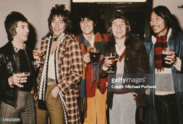 English rock group Faces, London, 1974. Left to right: keyboard player Ian McLagan, singer Rod Stewart, guitarist Ronnie Wood, drummer Kenney Jones...