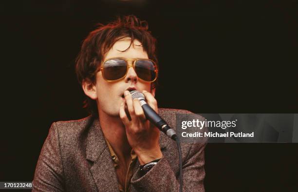 Singer-songwriter Jarvis Cocker performing with English pop group Pulp on the NME Stage at the Glastonbury Festival, Somerset, 26th June 1994.