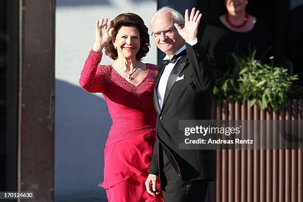 Queen Silvia of Sweden and King Carl XVI Gustaf of Sweden arrive at a private dinner on the eve of the wedding of Princess Madeleine and Christopher...