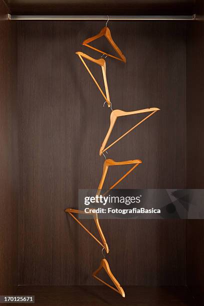 hanging hangers - wardrobe organisation stock pictures, royalty-free photos & images