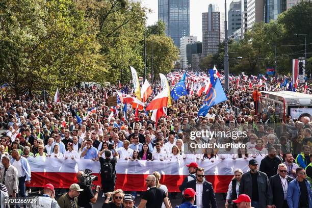 Polish opposition leader Donald Tusk and other politicians attend 'Million Hearts March' organized by Civic Coalition in Warsaw, Poland on October...