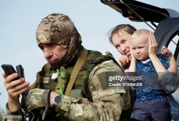 Medics, volunteers and military personnel undergo a tactical training, including first aid and the simulation of a wounded comrade evacuation, in the...