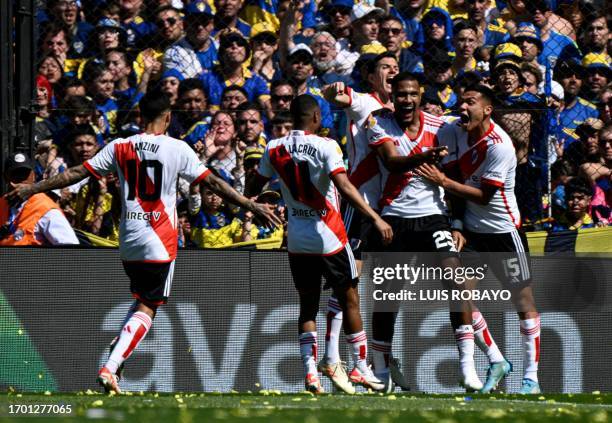 River Plate's forward Salomon Rondon celebrates with teammates after scoring against Boca Juniors during the Argentine Professional Football League...