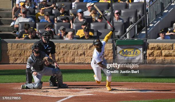 Liover Peguero of the Pittsburgh Pirates hits a triple in the second inning against the Miami Marlins at PNC Park on October 1, 2023 in Pittsburgh,...