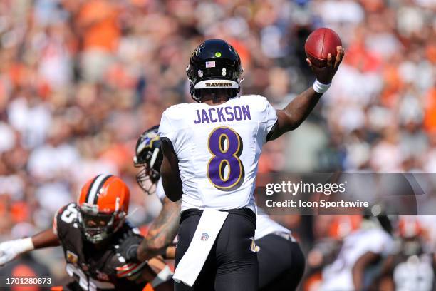 Baltimore Ravens quarterback Lamar Jackson throws a pass during the first quarter of the National Football League game between the Baltimore Ravens...