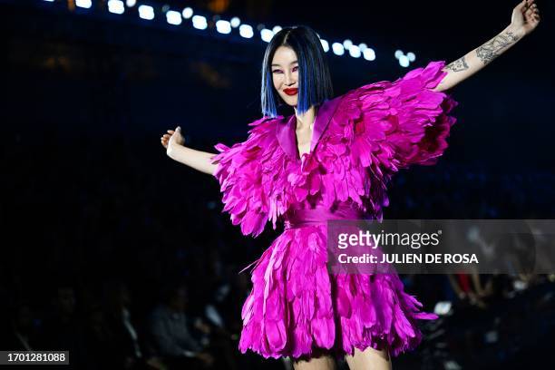 Model presents a creation for L'Oreal Paris during a show as part of the Paris Fashion Week Womenswear Spring/Summer 2024 in Paris on October 1, 2023.