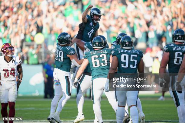 Philadelphia Eagles place kicker Jake Elliott is lifted by teammates after kicking a winning field goal during the game between the Philadelphia...