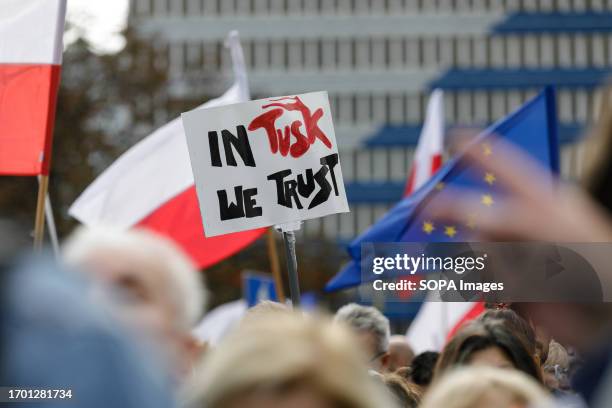 Placard with the inscription "It Tusk we trust" is visible before the start of The Million Hearts March in Warsaw. The Million Hearts March took...