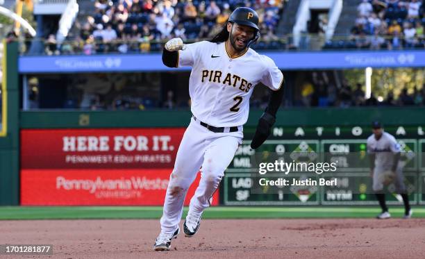 Connor Joe of the Pittsburgh Pirates reacts as he rounds the bases after an RBI double by Miguel Andujar in the eighth inning against the Miami...