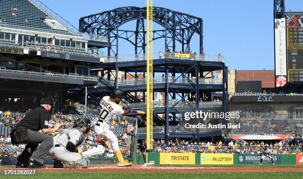 Liover Peguero of the Pittsburgh Pirates hits a triple in the second inning against the Miami Marlins at PNC Park on October 1, 2023 in Pittsburgh,...