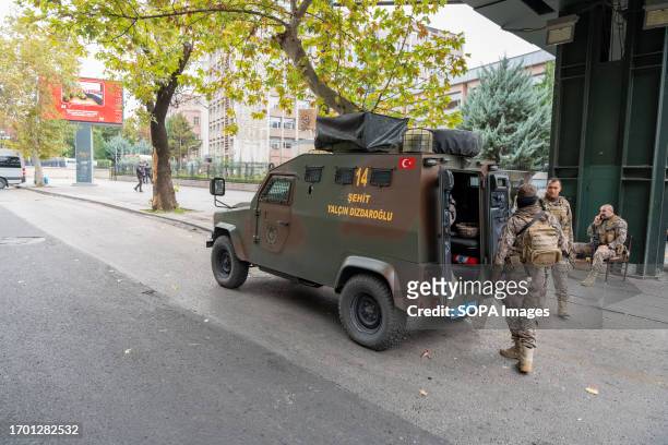 Heavily armed special operations police officers stand on guard in front of the Ministry of Internal Affairs, where the attack took place. At around...