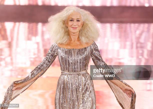 Helen Mirren walks the runway during the "Le Defile - Walk Your Worth" - 6th L'Oreal Show as part of Paris Fashion Week at the Eiffel Tower on...