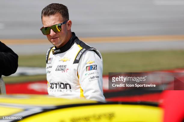 Allmendinger walks down pit road prior to the running of the NASCAR Cup Series Playoff YellaWood 500 on October 01, 2023 at Talladega SuperSpeedway...