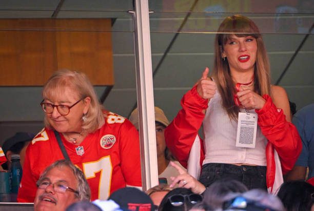 Donna Kelce, left, mother of Chiefs tight end Travis Kelce watched the game with pop superstar Taylor Swift, center, during the first-half on Sunday,...