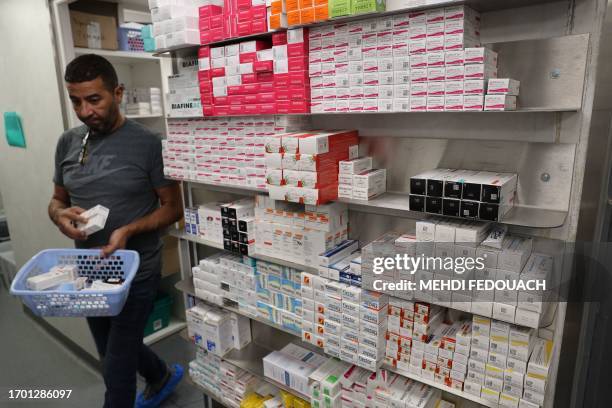 Pharmacist works in the the Delpech pharmacy in Paris, on September 28, 2023. Amoxicillin, corticoids and now flecaine: faced with supply...