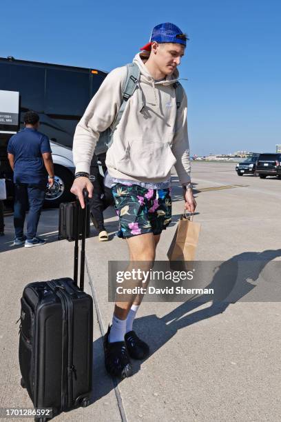 Vit Krejci of the Minnesota Timberwolves departs for Abu Dhabi on October 1, 2023 at Minneapolis - Saint Paul International Airport in Minneapolis,...