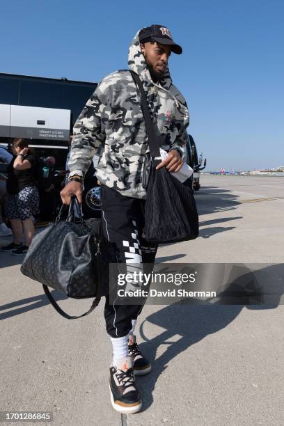 Troy Brown Jr. #7 of the Minnesota Timberwolves departs for Abu Dhabi on October 1, 2023 at Minneapolis - Saint Paul International Airport in...