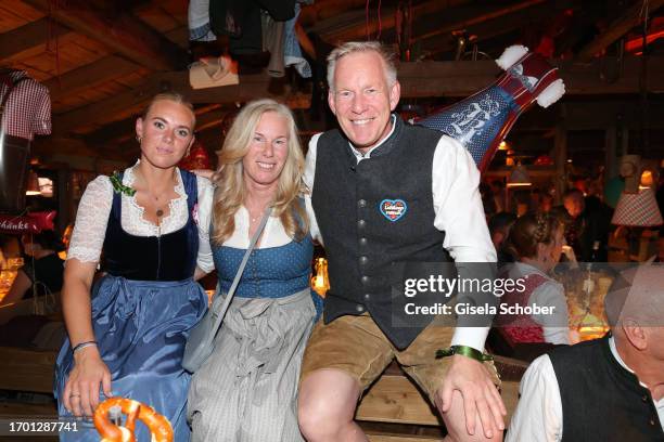 Johannes B. Kerner with his daughter Emily Kerner and sister Julia during the 188th Oktoberfest at Käferzelt on October 01, 2023 in Munich, Germany.