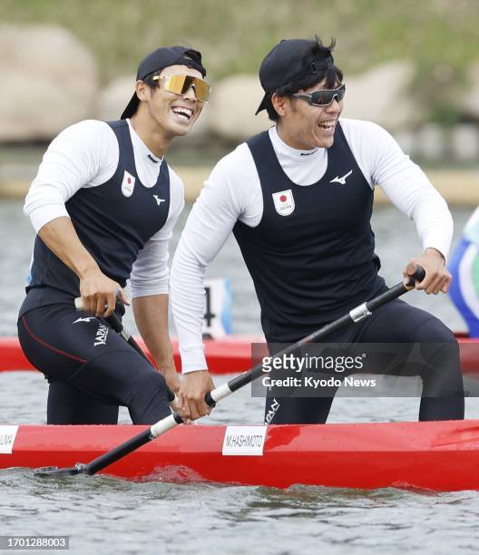 Japan's canoe sprint team of Ryo Naganuma and Masato Hashimoto are pictured after the men's canoe sprint double 500-meter final at the Asian Games in...
