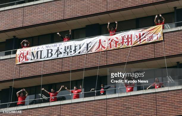 Banner celebrating hometown hero and Los Angeles Angels player Shohei Ohtani's becoming the first Japanese MLB home run champion hangs outside the...