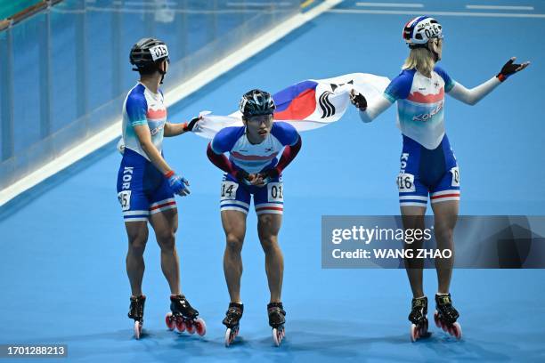 South Korea's Jung Cheol-won reacts after the men's final of the speed skating 3000m relay race during the 2022 Asian Games in Hangzhou in China's...