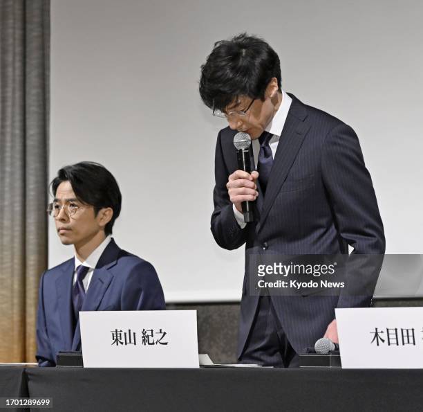 Noriyuki Higashiyama , president of Johnny &amp; Associates Inc., bows during a press conference in Tokyo on Oct. 2 alongside Yoshihiko Inohara,...