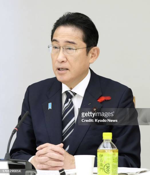 Japanese Prime Minister Fumio Kishida attends a government meeting over policies related to children at the premier's office in Tokyo on Oct. 2, 2023.