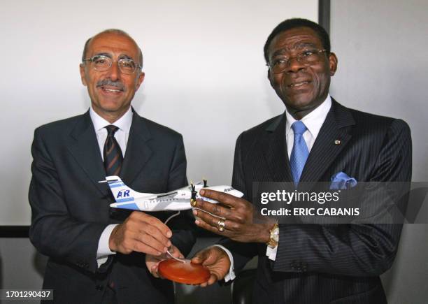 Equatorial Guinea's President Teodoro Obiang Nguema Mbasogo and Filippo Bagnato, chief executive of French and Italian airplane manufacturer ATR,...