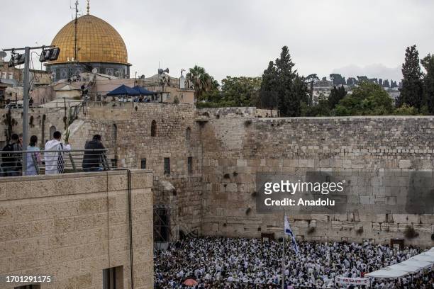 Jews pray in front of Western Wall during the Jewish holiday of Sukkot, which is a weeklong Jewish holiday that comes five days after Yom Kippur, in...