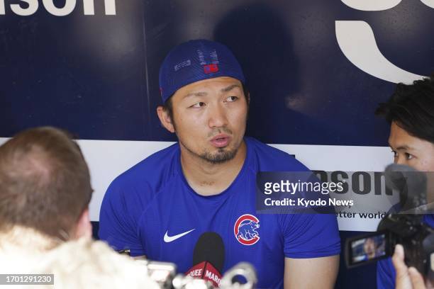 Chicago Cubs player Seiya Suzuki speaks to reporters prior to the regular-season finale against the Milwaukee Brewers at American Family Field in...