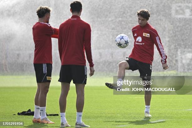 Union Berlin's US midfielder Brenden Aaronson attends a training session on the eve of the UEFA Champions League football match between Union Berlin...