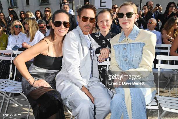 Susan Downey, Robert Downey Jr., Julia Milner and Cate Blanchett attend the Stella McCartney show during Paris Fashion Week Womenswear Spring/Summer...