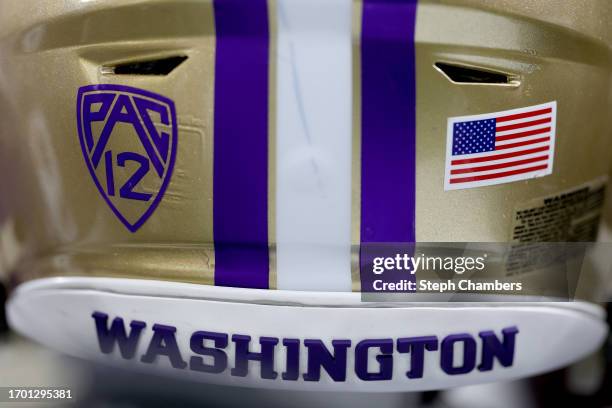 Detail of the Pac-12 Conference logo is seen on the helmet of a Washington Huskies player during the game against the California Golden Bears at...