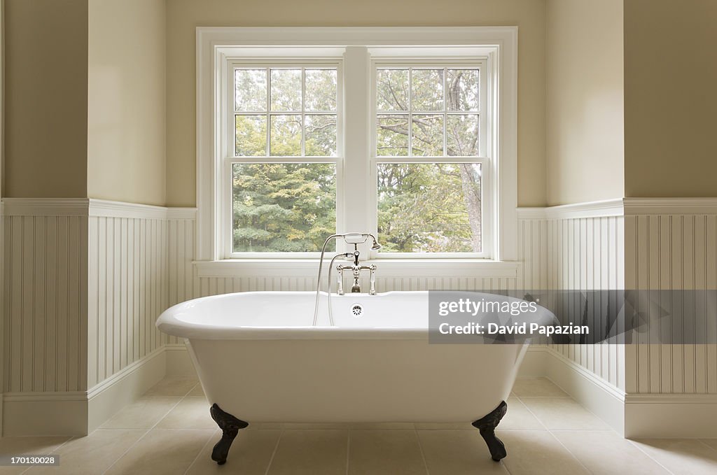 Clawfoot bathtub in custom designed bathroom.