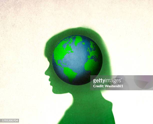 planet earth inside silhouette of woman - global business stock illustrations