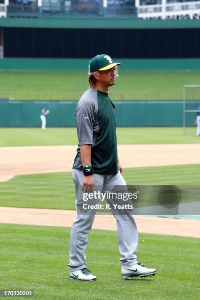 Hideki Okajima of the Oakland Athletics during batting practice before the game against the Texas Rangers at Rangers Ballpark on May 22, 2013 in...