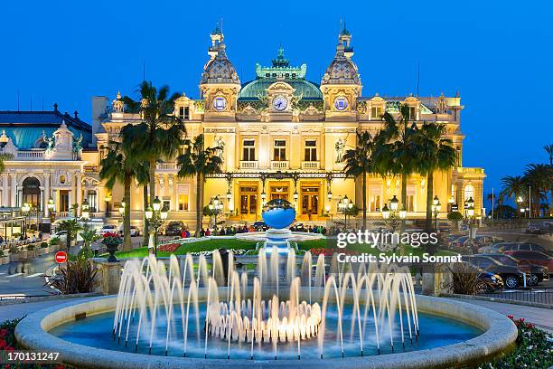 monaco, monte carlo, the casino at dusk - monte carlo stock pictures, royalty-free photos & images