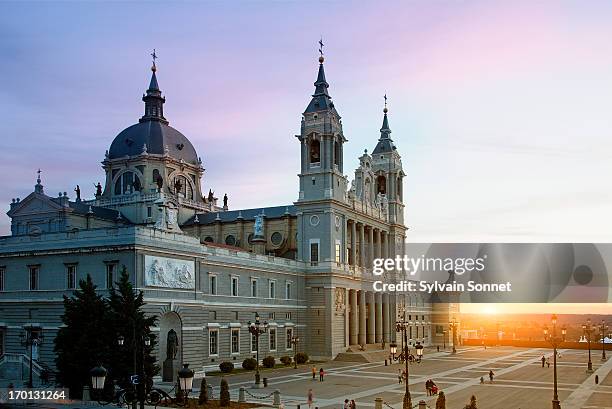 madrid, almudena cathedral at sunset - royal cathedral stock pictures, royalty-free photos & images