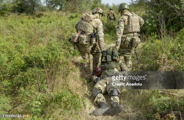 Health workers, volunteers and military personnel hold a joint training for war-zones in Aksaysky District in Rostov Oblast, Russia on October 01,...