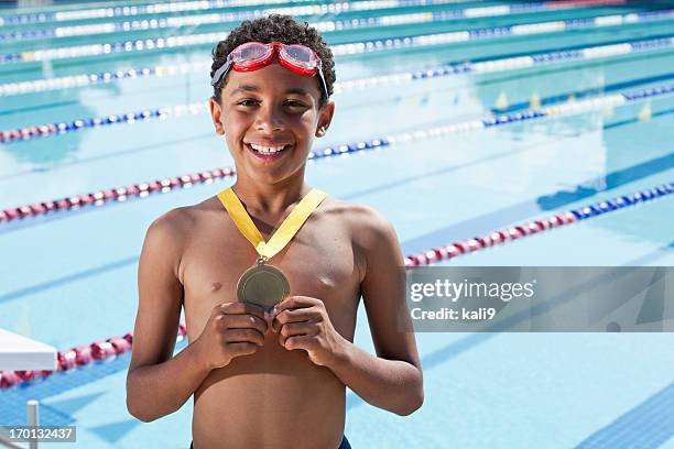 young swimmer with a medal - kids winning stock pictures, royalty-free photos & images