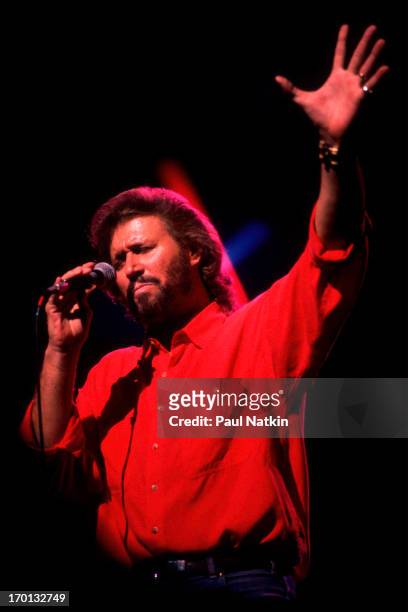 British pop singer Barry Gibb of the group the Bee Gees performs on stage at the Poplar Creek Music Theater, Hoffman Estates, Illinois, July 31, 1989.