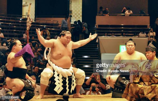 Sumo grand champion Terunofuji performs a yokozuna ring-entering ritual at the All Japan Rikishi Championship, a non-ranking event held at Ryogoku...